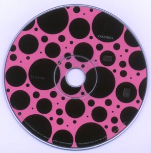 pink background with black polka-dots - the actual CD - the only words are "Columbia" and "Ruff House" but not band name or album name